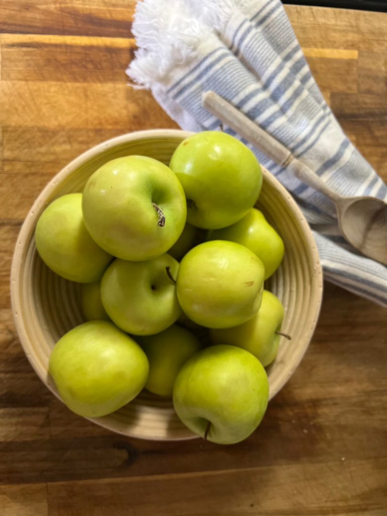 Bowl of Green Apples ready to be peeled