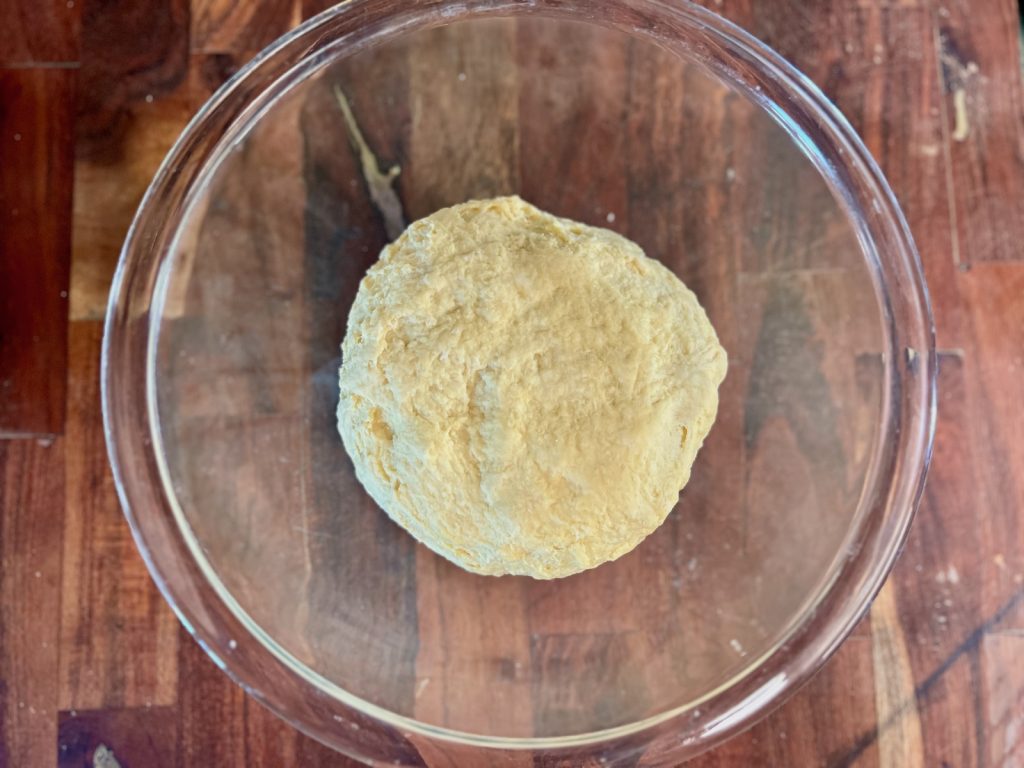 Cranberry orange sourdough dough in a glass bowl before overnight fermentation