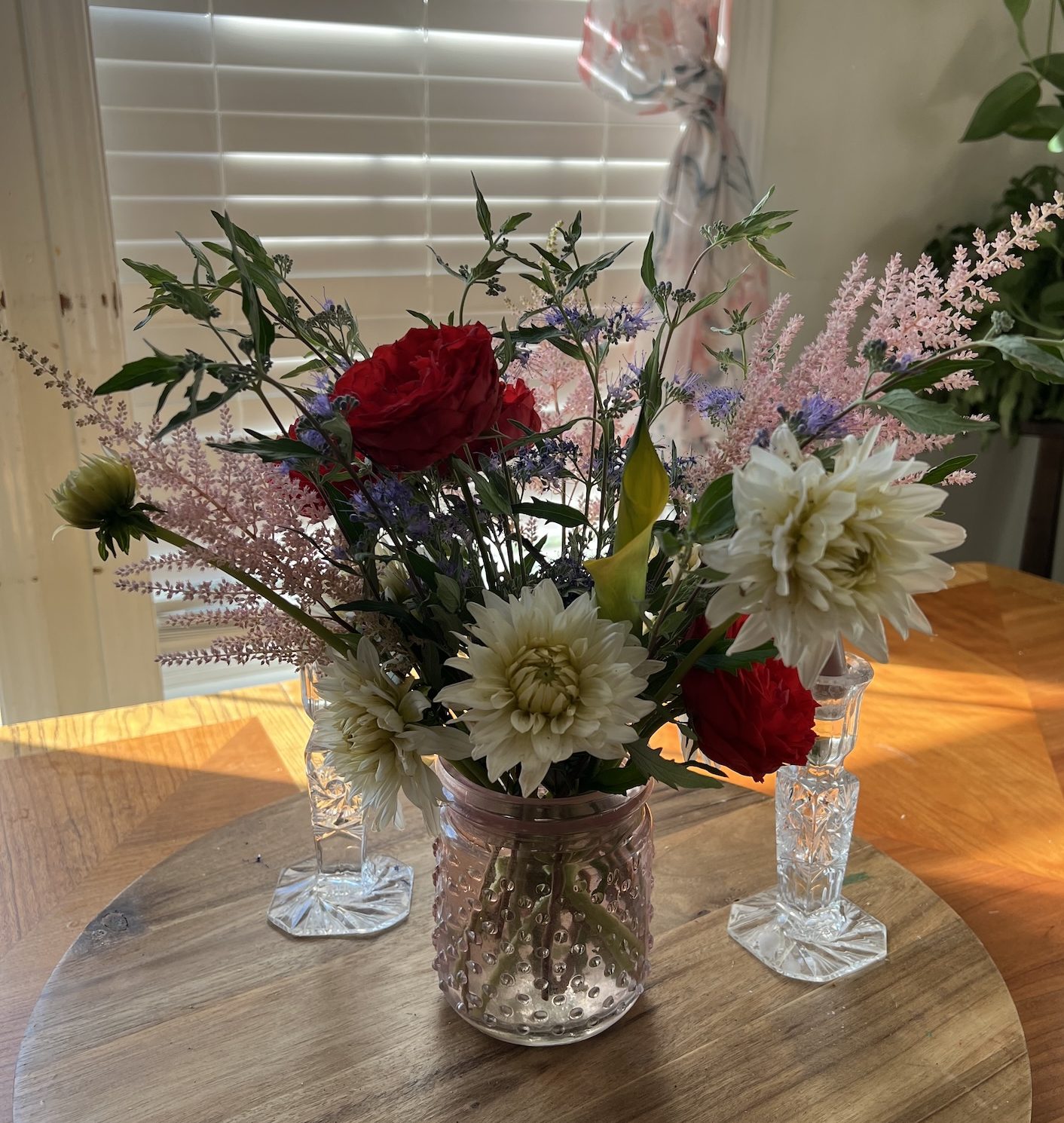 Homestead-grown flowers arranged in a vase by Deborah