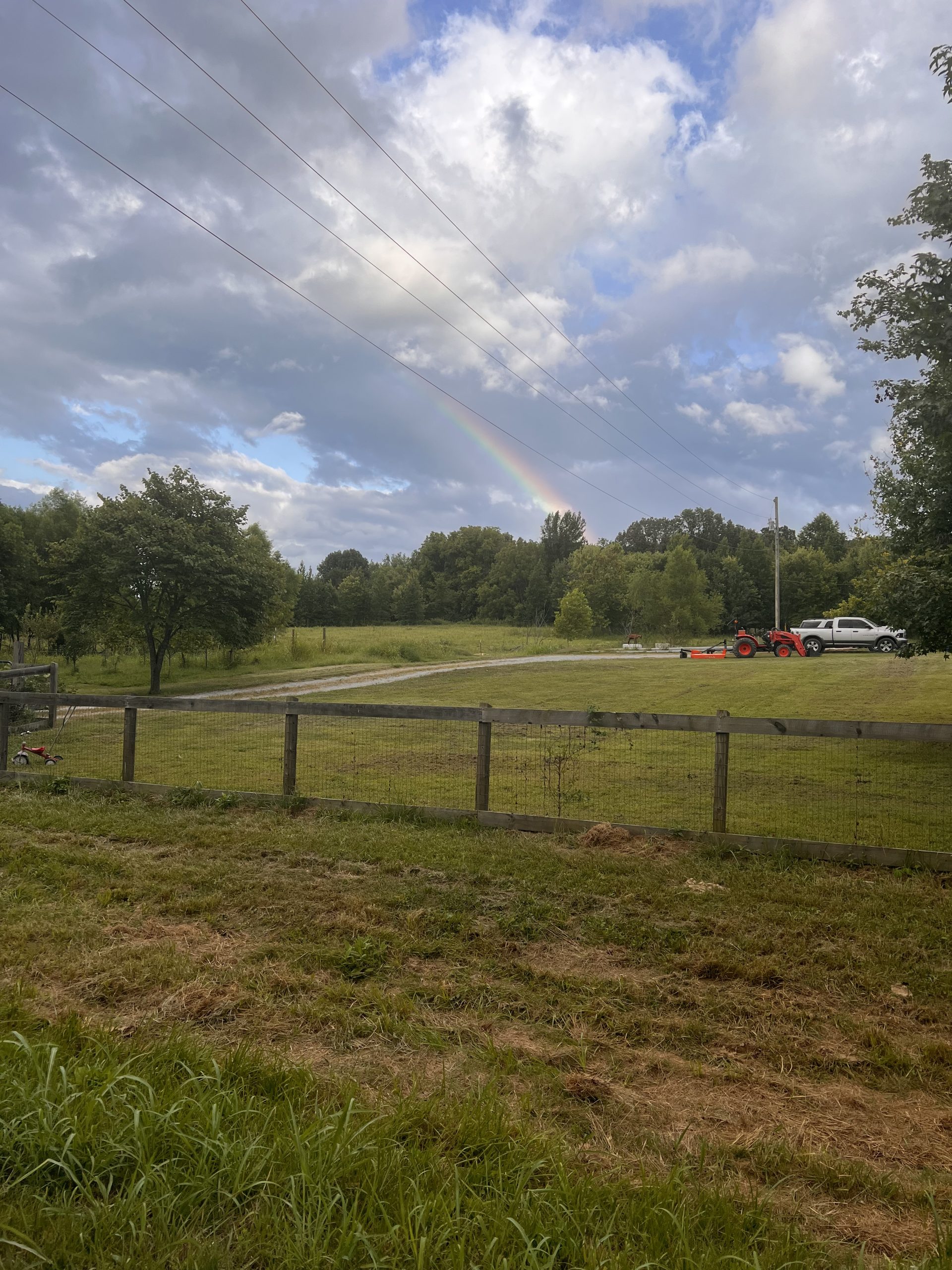 Rainbow over the Langton family farmstead in rural Middle Tennessee