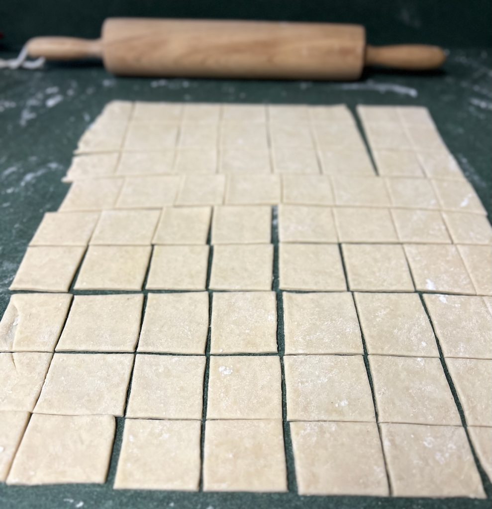 Dumpling dough rolled thin and cut into squares