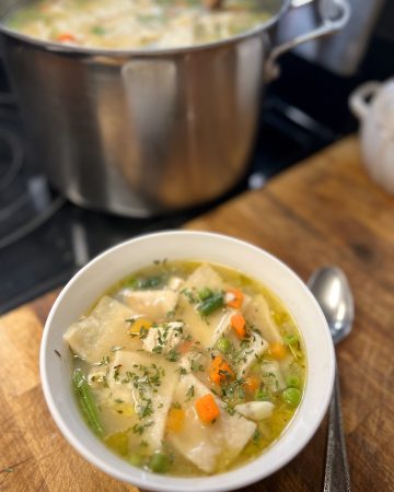 Sourdough discard chicken and dumplings with homemade rolled dumplings, chicken, and mixed vegetables.